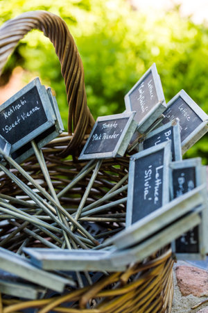 Garden tags in the basket ready to mark plants.の写真素材