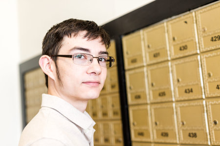 College student checking mail at mailboxed.