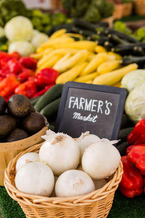 Fresh organic produce on sale at the local farmers market.の写真素材