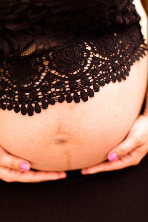 Pregnant young woman on last month of pregnancy.