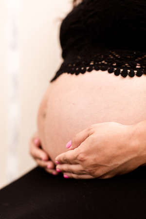 Pregnant young woman on last month of pregnancy.の写真素材