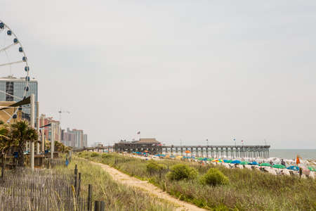 Myrtle Beach, South Caroline, USA-July 10, 2014. Boardwalk in Myrtle Beach, South Carolina.のeditorial素材