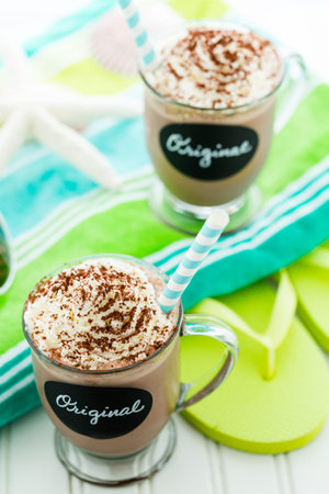 Gourmet original cold chocolate drink garnished with cocoa powder.の写真素材