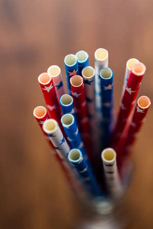 red, white and blue paper straws with stars.の写真素材