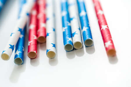 red, white and blue paper straws with stars.の写真素材
