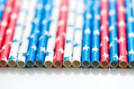 red, white and blue paper straws with stars.の写真素材