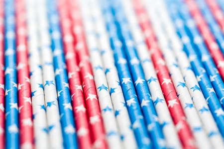 red, white and blue paper straws with stars.の写真素材