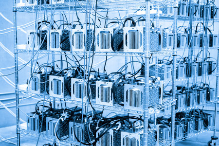 Denver, Colorado, USA-August 13, 2014. Row of bitcoin miners set up on the wired shelfs.のeditorial素材