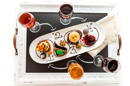 Tasting of wine and pattie chocolate pastries at the chocolate and beer and wine pairing party.の写真素材