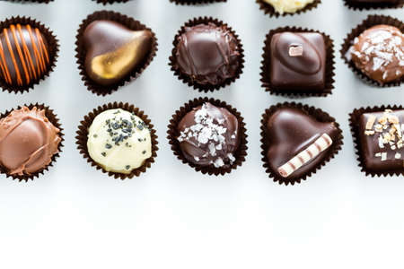 Delicious gourmet chocolate truffles hand made by professional chocolatier.の写真素材