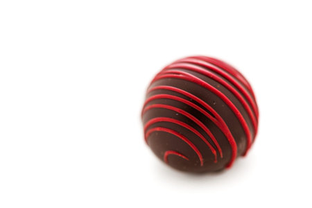 Gourmet raspberry rendezvous truffle on a white background.の写真素材