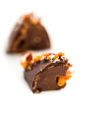 Gourmet maple bacon truffle on a white background.