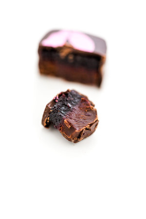 Gourmet blackberry cabernet truffle on a white background.