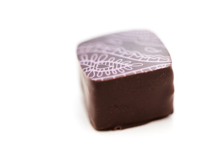 Gourmet honey lavender truffle on a white background.