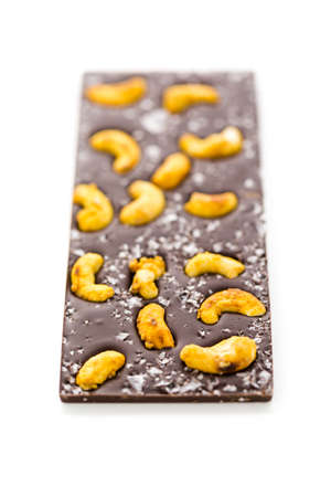 Gourmet Cosmic cashew chocolate bar on a white background.の写真素材