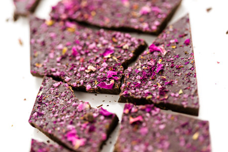 Gourmet wine and roses chocolate bar on a white background.