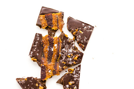 Gourmet danamites bacon chocolate bar on a white background.の写真素材