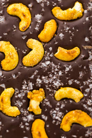 Gourmet Cosmic cashew chocolate bar on a white background.の写真素材