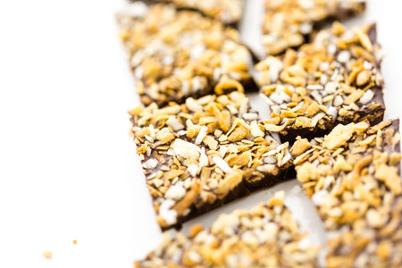 Gourmet coconut bliss chocolate bar on a white background.の写真素材