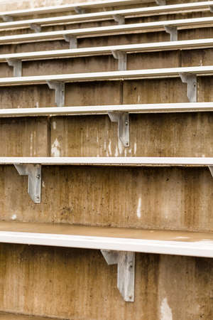 Empty stadium seating on college stadium campus.の写真素材