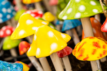 Bright ceramic mushrooms for decorating garden.の写真素材