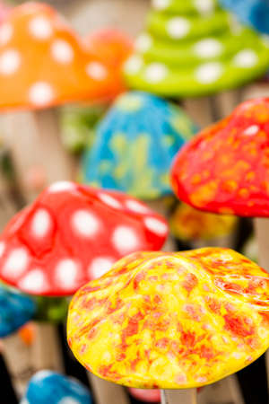 Bright ceramic mushrooms for decorating garden.の写真素材