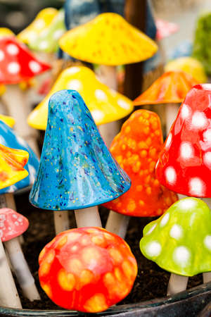 Bright ceramic mushrooms for decorating garden.の写真素材