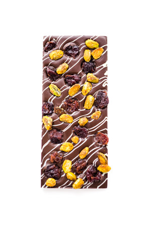 Gourmet Pistachio cherry chocolate bar on a white background.