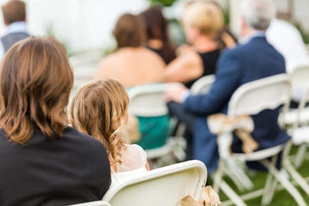 Outdoor wedding ceremony of small late summer wedding.の写真素材