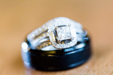 Close up of wedding rings from precious metals.
