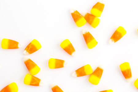 Candy corn candies on a white background.の写真素材
