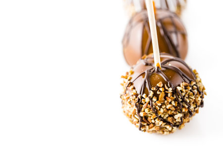 Hand dipped caramel apples decorated for Halloween.の写真素材