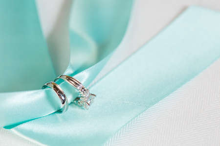 Wedding wings on blue ribbon.の写真素材
