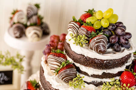 Gourmet tiered wedding cake at wedding reception.の写真素材