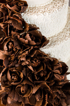 Gourmet tiered wedding cake at wedding reception.の写真素材