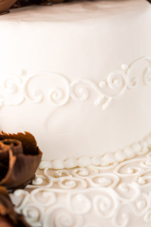 Gourmet tiered wedding cake at wedding reception.の写真素材