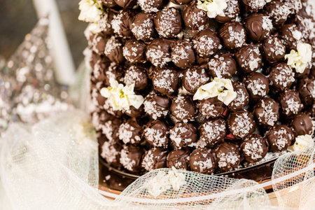 Gourmet truffle cone wedding cake at wedding reception.の写真素材