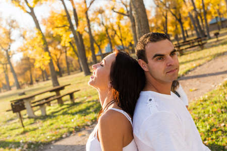 Carving big orange pumpkins for Halloween in late Autumn.の写真素材