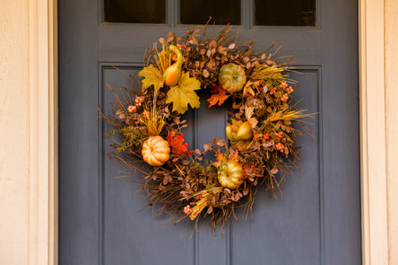 Autumn wreath decorating front door.の写真素材
