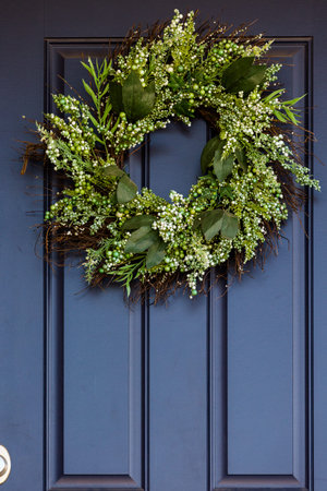Autumn wreath decorating front door.の写真素材