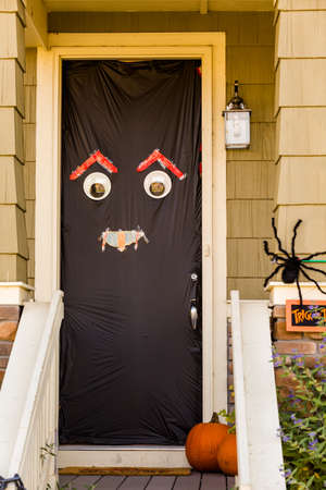 Residential house decorated for Halloween holiday.のeditorial素材