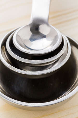 Measuring cups and spoons on the table.の写真素材