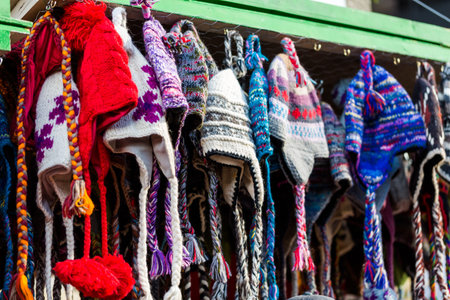 Hand made wool hats on display at the local Christmas market.