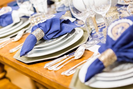 Table set holiday dinnner with family.