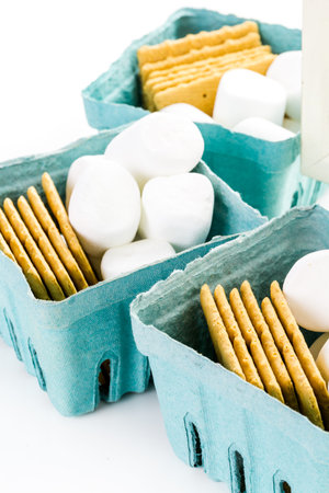 Smores station with large white marshmallows at the party.