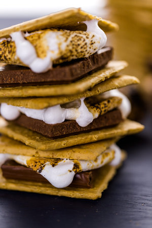 Freshly toasted smores with large white marshmallows.の写真素材