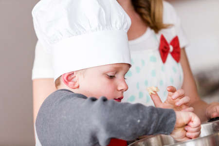 Making cookies with family for Christmas.の写真素材