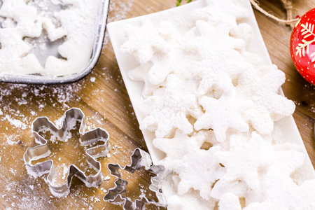 Making marshmallows in shapes of snowflakes for garnish hot chocolate.の写真素材