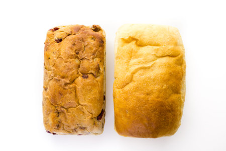 Freshly baked sourdough breads on a white background.の写真素材