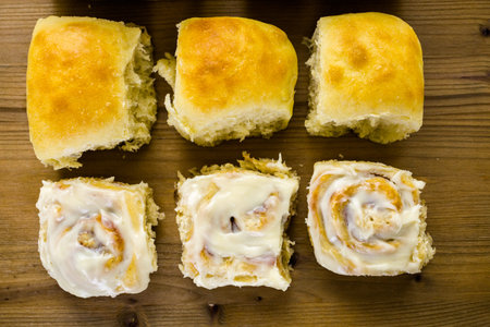 Freshly baked sourdough breads on wood cutting board.の写真素材